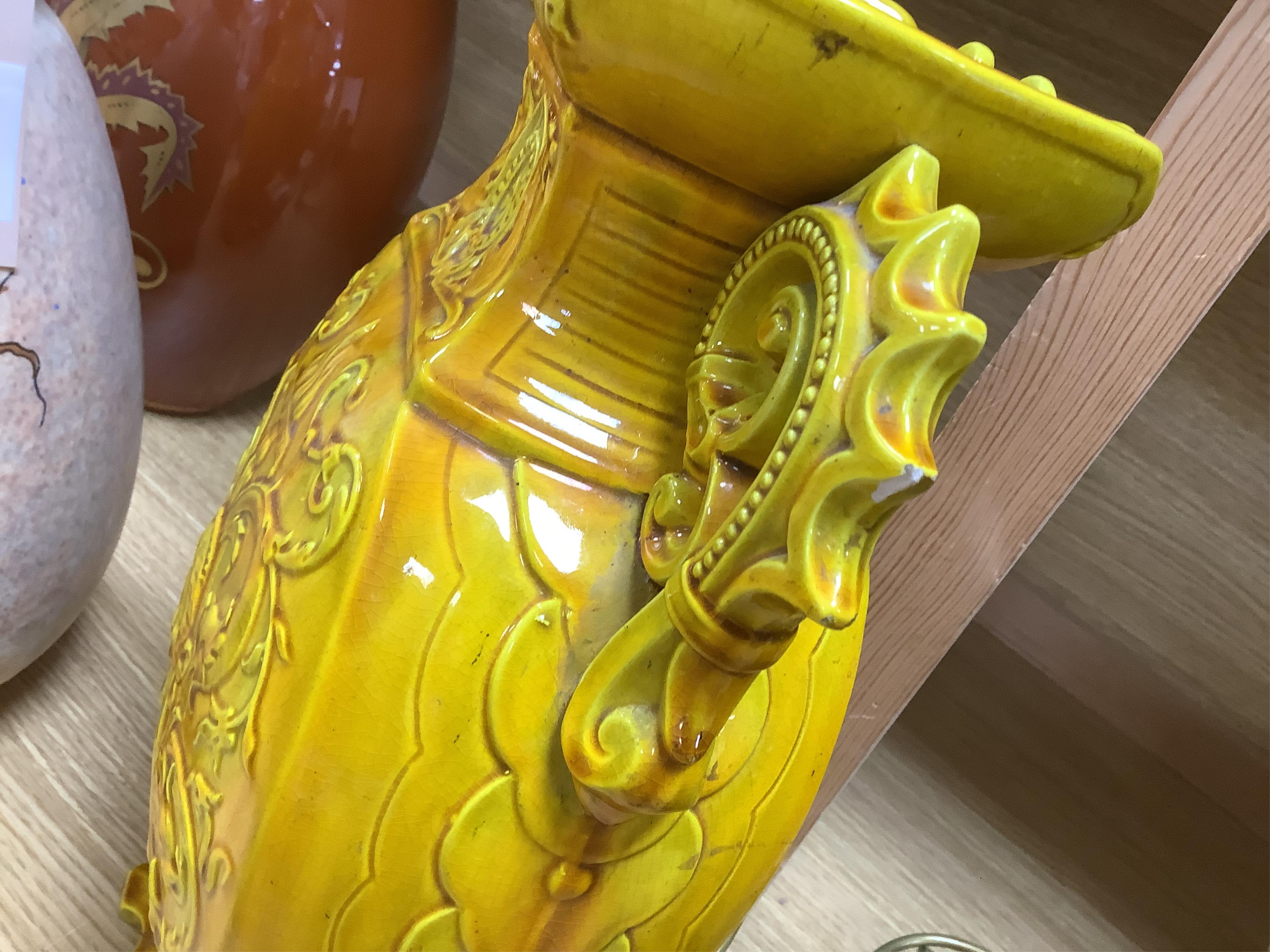 A pair of late 19th century Majolica yellow glazed vases, mounted as table lamps, marked ‘W & Co’ to base, 47cm total
